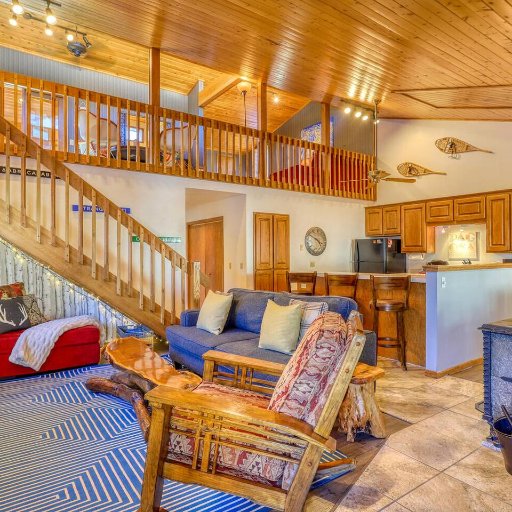Living Room Area and Staircase to Loft